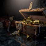 An open treasure chest, treasures within