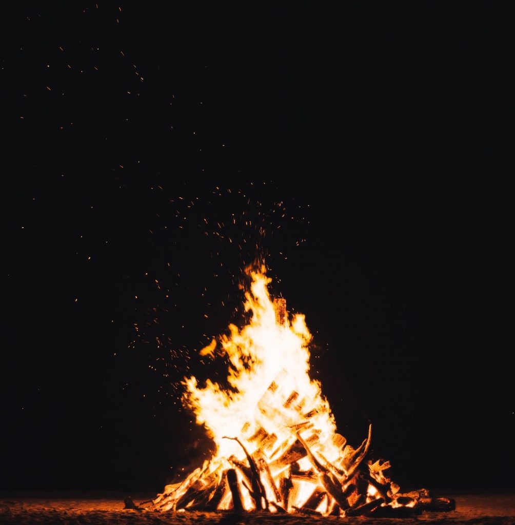 A blazing bonfire in the depth of the night