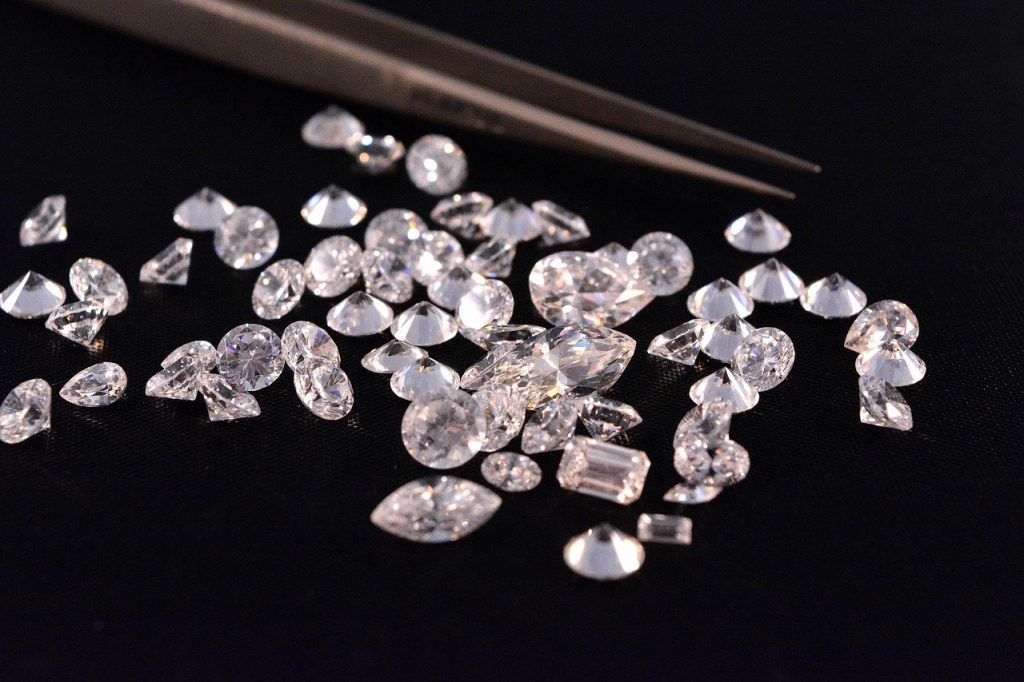 Diamonds scattered against a black background